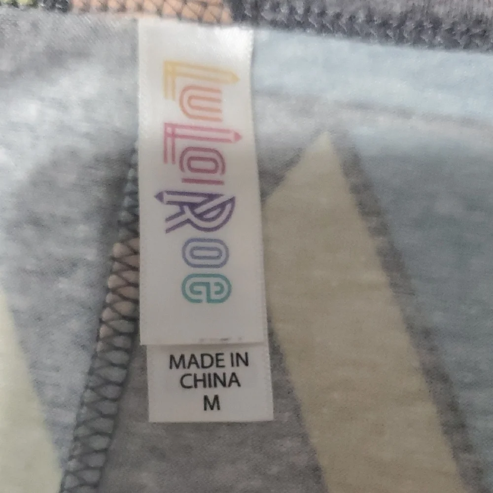 LuLaRoe Gray Tee with Pastel Geometric Pattern